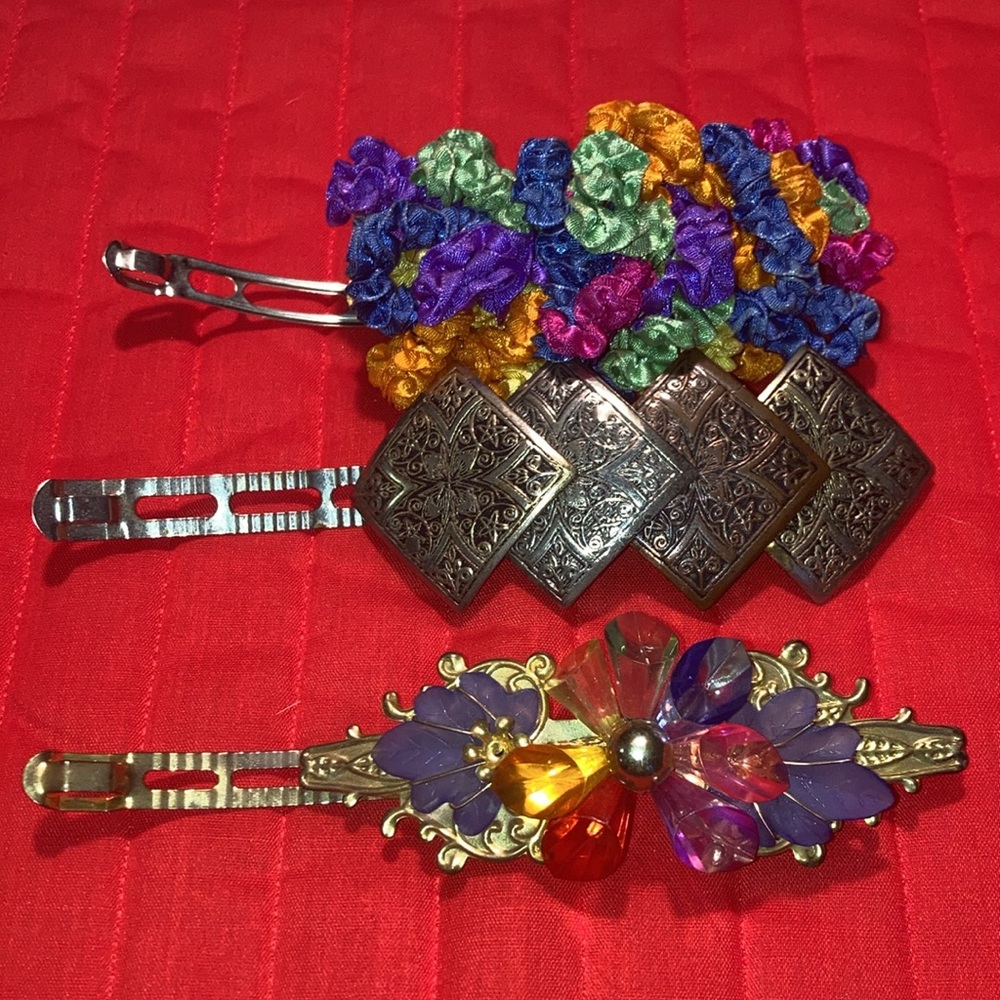 Lot of 3 long hairbarrettes, 1 scrunched ribbons, 1 colorful beads, 1 metal. $29
